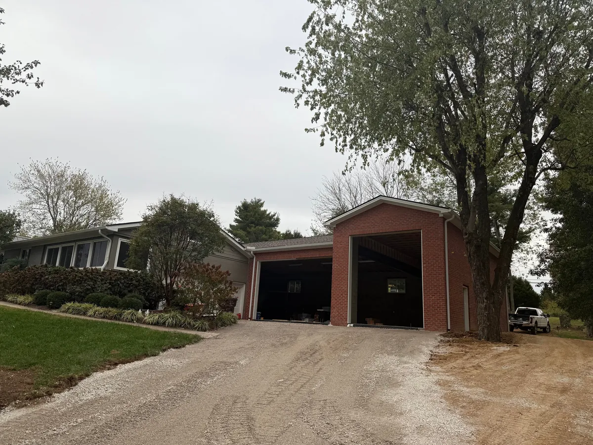 Occupancy permit achieved. Now it’s time for doors, lift, waste oil heater, driveway, and sealing the floors