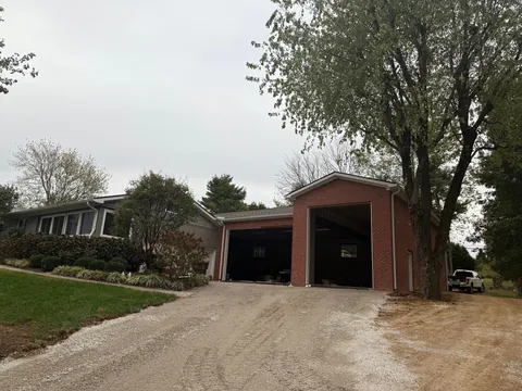 Occupancy permit achieved. Now it’s time for doors, lift, waste oil heater, driveway, and sealing the floors