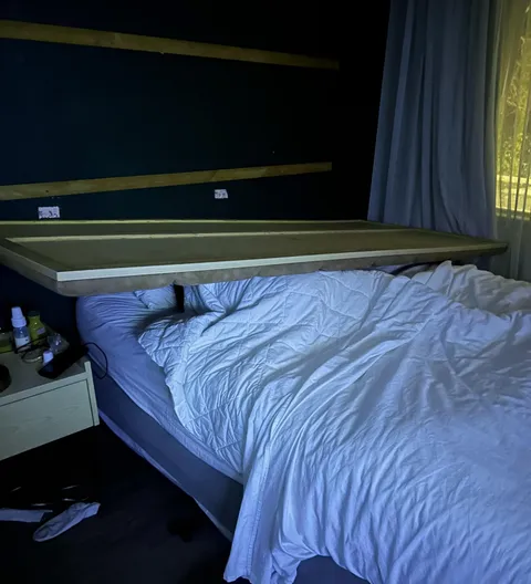 Headboard fell on top of my head in the middle of the night while I was sleeping.