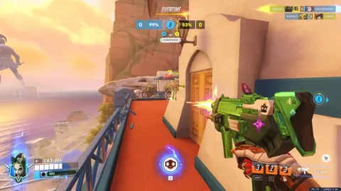 You can time a ping to continue to see Sombra after she is fully invisible.