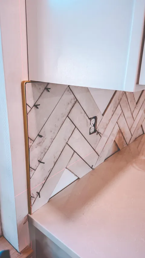 Update: Herringbone backsplash - never again