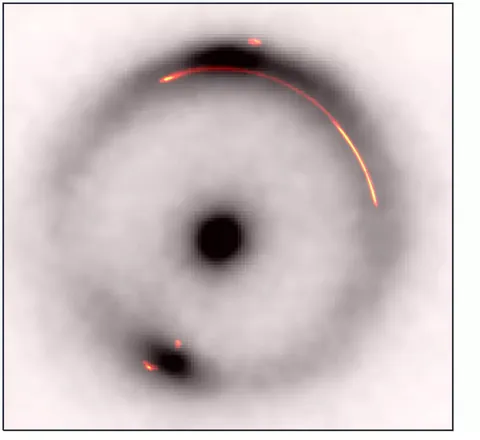 Astronomers have used gravitational lensing to detect the smallest dark object ever measured this way, a mass about one million times that of the Sun, situated some 10 billion light-years away, when the universe was roughly 6.5 billion years old.