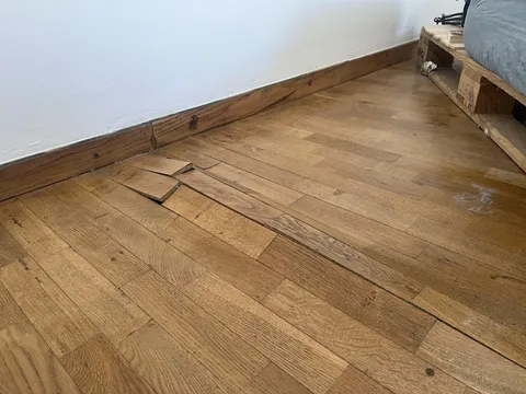 Flooring under my bed bulges?