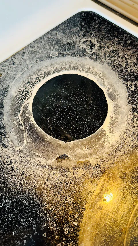 Optical illusion from some spilled sodium bicarbonate on the stove