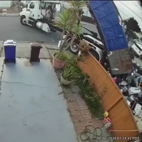 Disgruntled dump truck driver unloads trash onto the driveway of a client who allegedly refused to pay in San Pablo, California.