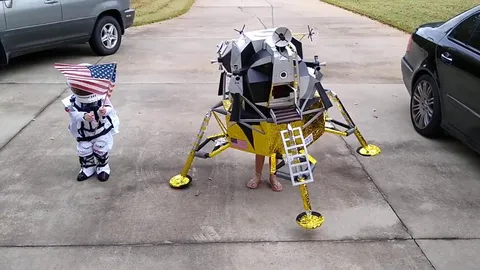 These Sister where inspired by the book "I am Neil Armstrong" and dressed up as a Lunar Lander and Astronaut!