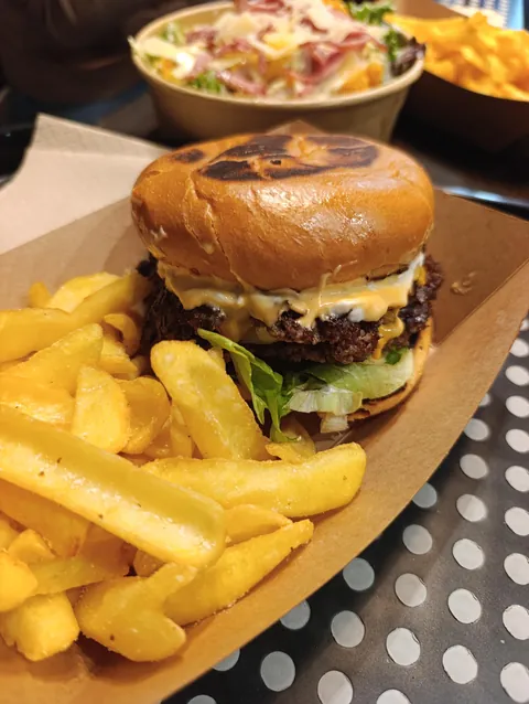 [I ate] a double smash cheeseburger in a Garfield themed restaurant