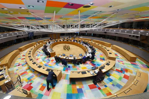 Viktor Orbán watches from a distance as Volodymyr Zelenskyy addresses EU leaders