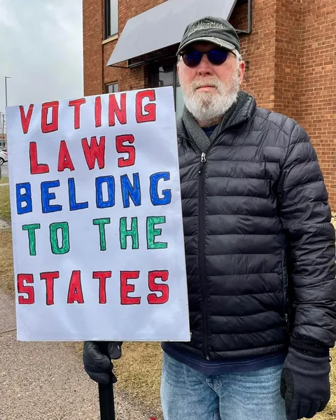 Demonstrators in deep red Barron County, WI remind people of tomorrow's Supreme Court election. [OC]