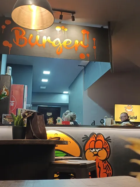 [I ate] a double smash cheeseburger in a Garfield themed restaurant