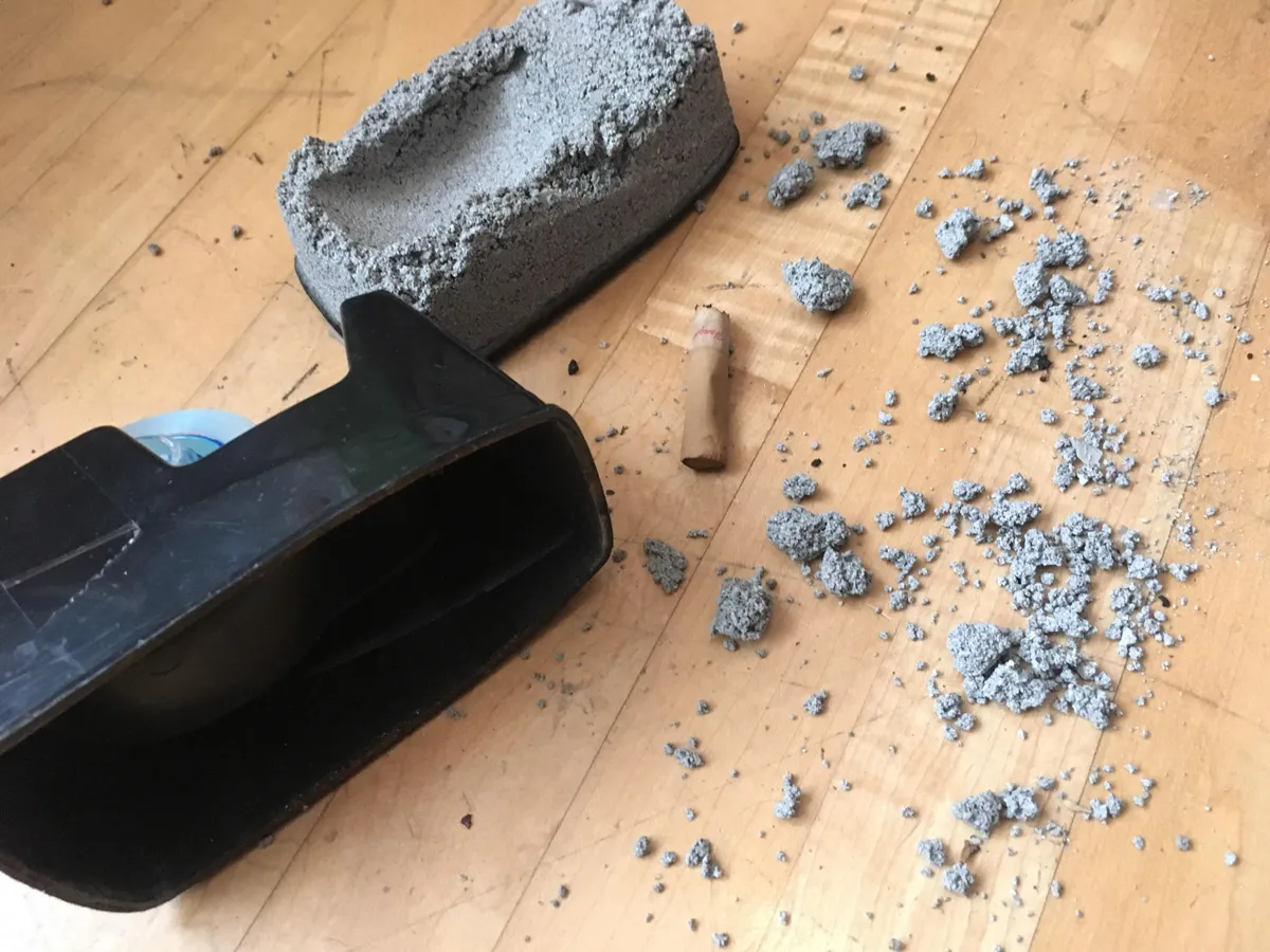 My tape dispenser broke and it was filled with concrete and a cigarette.