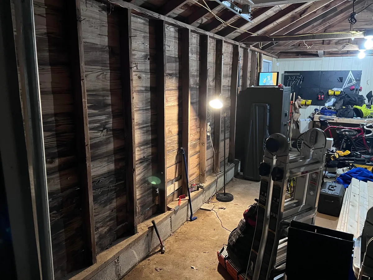 Completed a weekend project! Shelves and a workbench built into my garage.