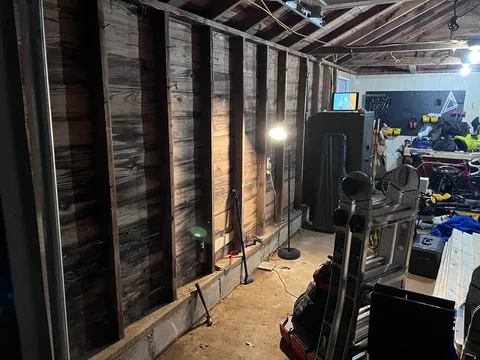 Completed a weekend project! Shelves and a workbench built into my garage.