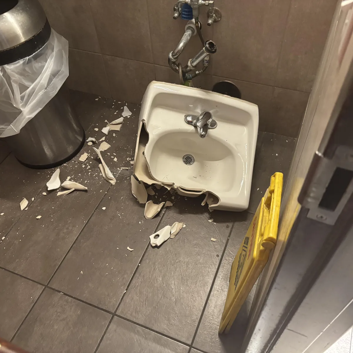 The sink I told management that  needs to be secured properly to wall for months finally broke