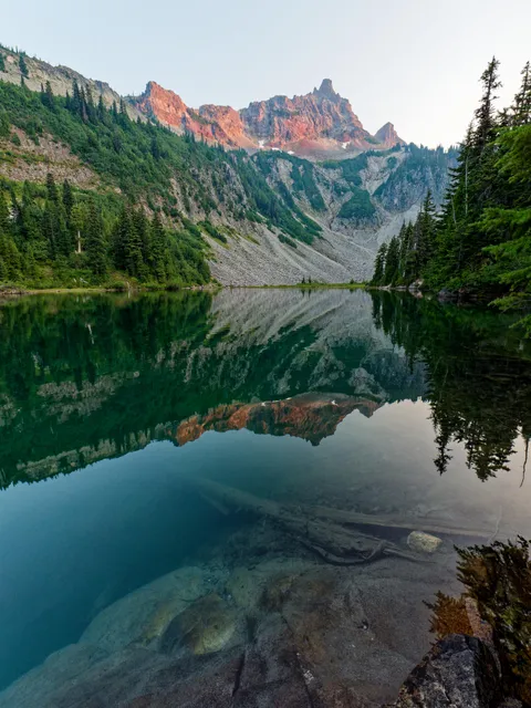 Unicorn Peak reflected in Snow Lake @ Mount Rainier National Park. [OC][3000x4000]