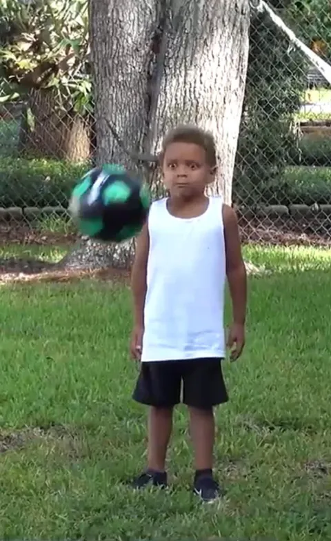 PsBattle: A kid that's about to get hit in the face with a soccer ball