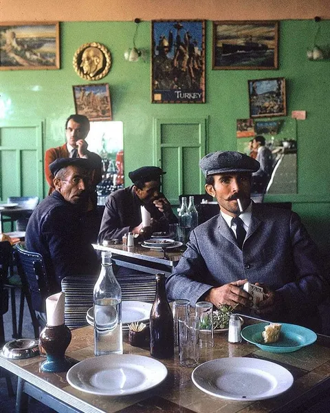 Turkish men having a lunch in a restaurant, 1970 Nevşehir