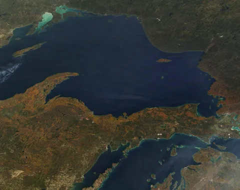 Peak autumn colored leaves around Lake Superior on October 18, 2024, when the Moderate Resolution Imaging Spectroradiometer (MODIS) on NASA’s Terra satellite acquired this true-color image. 