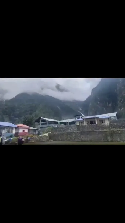 Massive landslide blocks a river in Nepal, triggering flash-flood fears