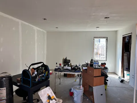 Turned my 1903 three car garage into 1/2 garage and 1/2 bedroom and bathroom my