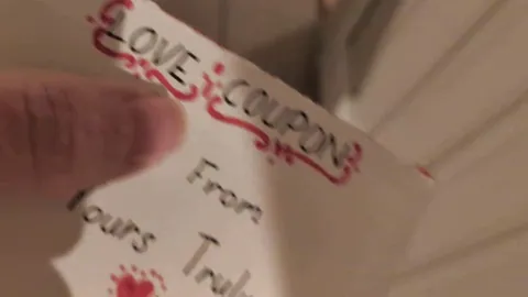 Surprised her with one of her sex coupons. She gladly accepted.