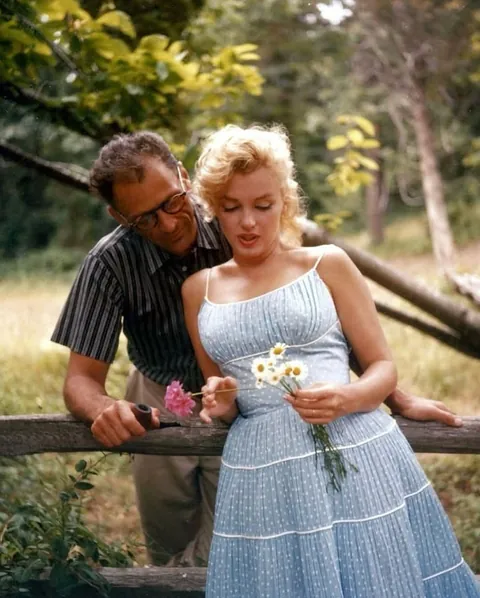 Marilyn Monroe and her husband Arthur Miller were photographed at their home in Amagansett,1957