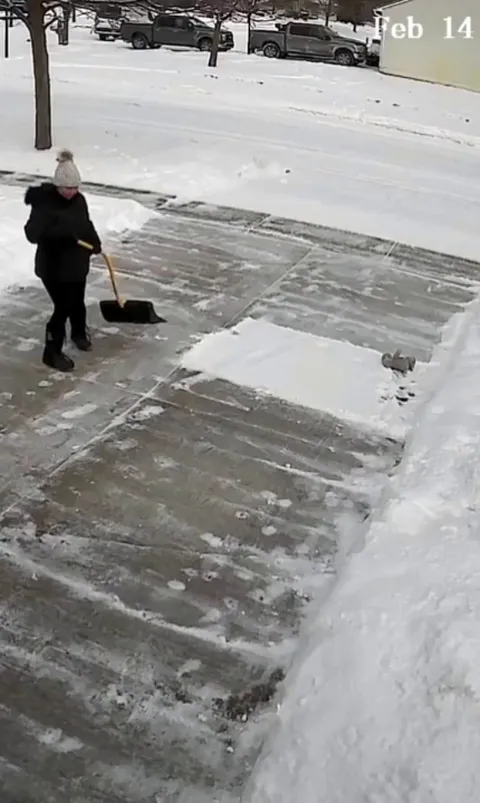 My sweet old boy helping me shovel.
