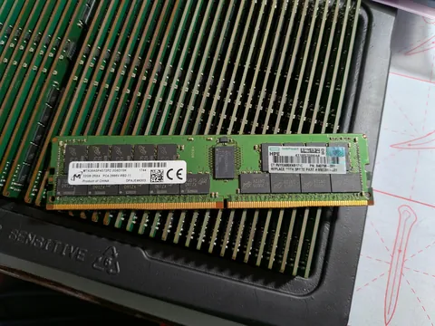2 years ago, my dad's company bought new servers and immediately upgraded the RAM. They were going to throw away the replaced sticks so he saved them from the dumpster and gave them to me. I present to you 72x32GB HPE DDR4-2666MHz ECC RDIMMs.