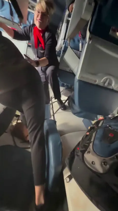 Flight attendants evacuating passengers from the upside down Delta plane that crashed in Toronto