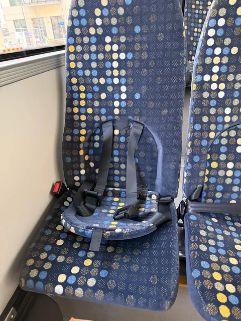 Found these bus seats in Stockholm with fold-down child seating.