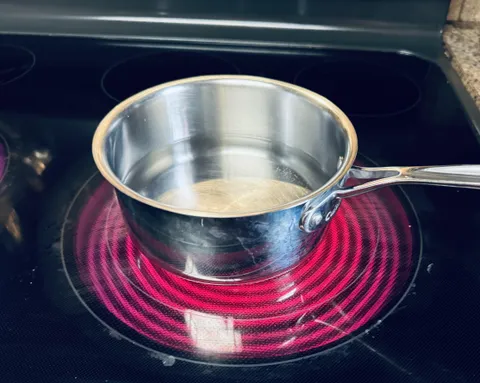 My wife when she cooks.  It 100% mildly annoys me. Maybe I’m the bad guy. Idk. 