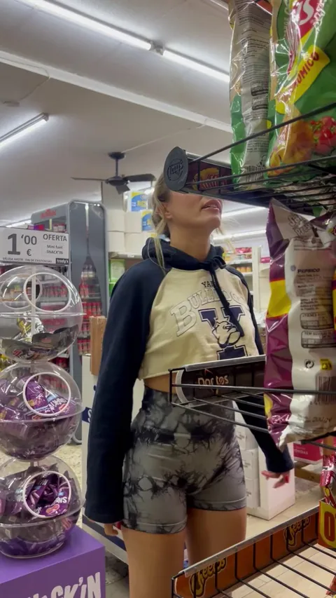 Reaching for chips and almost flashing the whole store… whoops! 