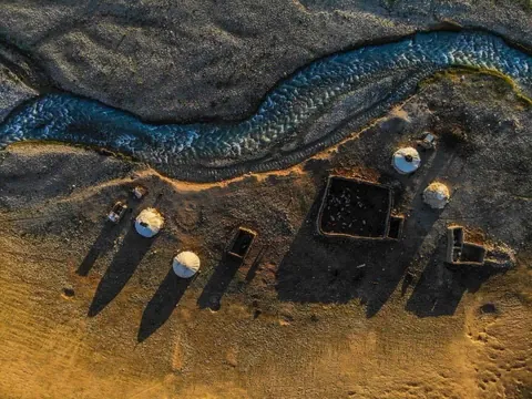 Pamirs of the Wakhan Corridor in Afghanistan. I walked alone across the border bridge at Ishkashim, hitched a ride then hired a donkey and walked up the valley for a week, then hired a horse and rode into the mountains for three weeks. Best trip ever!