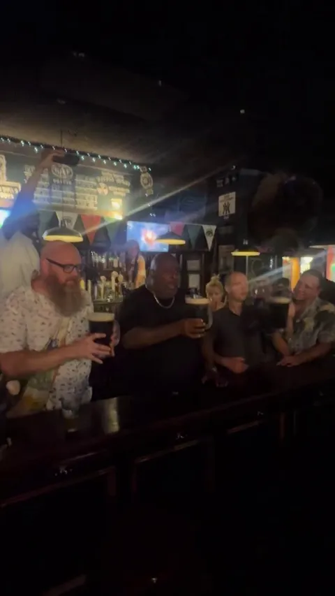 Impromptu Guinness Chugging Contest at the Nathan’s Hot Dog Eating Contest After Party