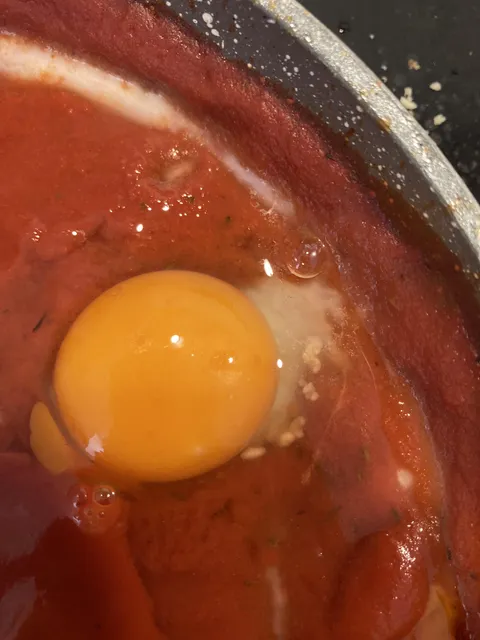 What are all these tiny white spots in my egg?