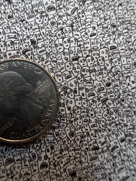 A pen drawing I just finished that has 1000s of tiny faces. I used magnifying glasses to get as detailed as possible