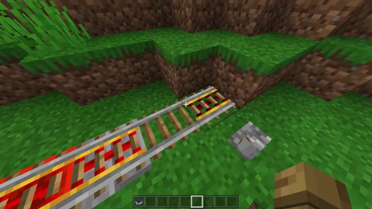 I'll see your floating minecart, and raise you... speedy bouncy minecarts with a functioning entry/exit system!