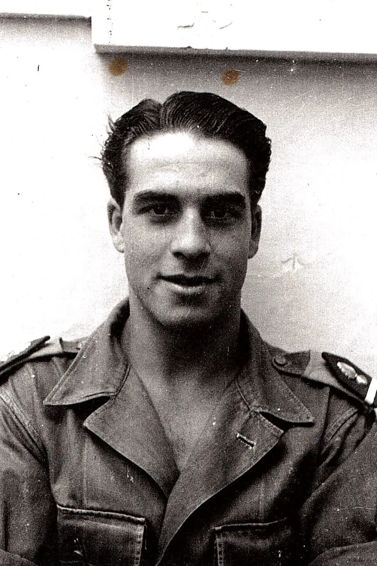 My grandpa looking devilishly handsome in the 40's