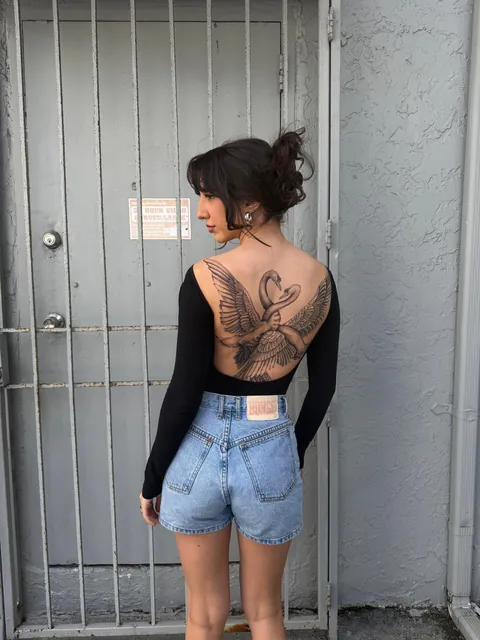 Entangled swans back piece by @chriscalibur_ at Ocho Placas in Miami