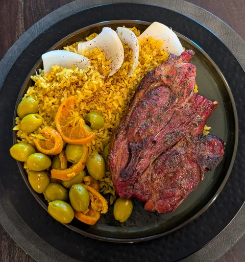 Smokes lamb and saffron rice