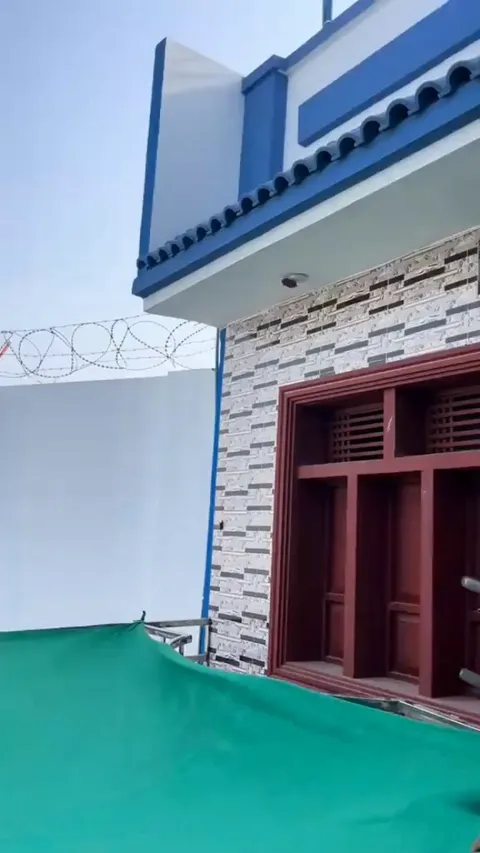 A guy, yellow jackets and piece of cloth.