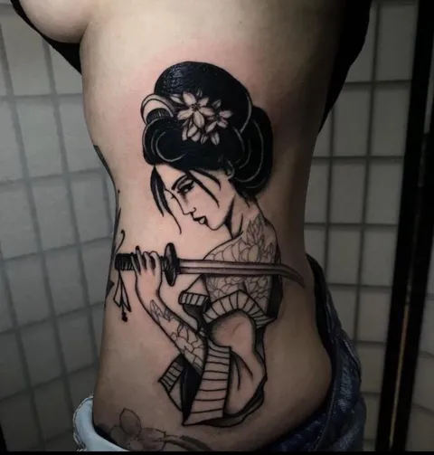 A tattooed Giesha by Joey Rosado at Sacred Tattoo Shop in NYC