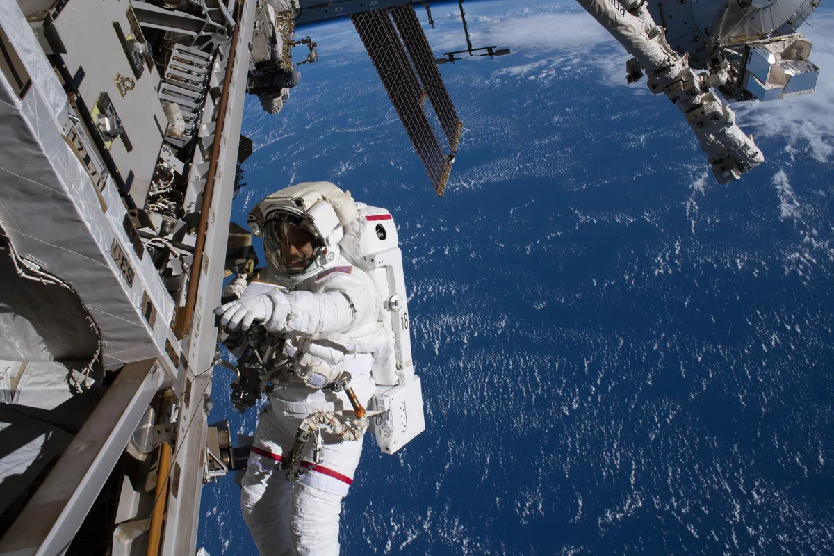 NASA astronaut Ricky Arnold on a spacewalk outside the International Space Station