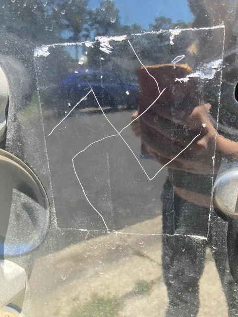 Someone scratched this into my jeep now i have to cover it with tape until i can afford a new paint job