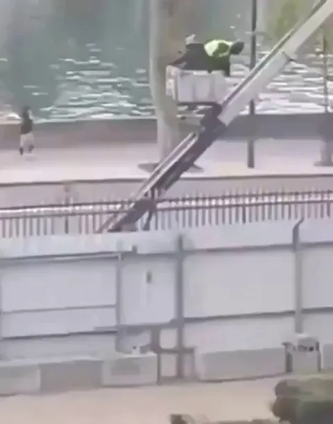 Footage of the thieves' escape from the Louvre.