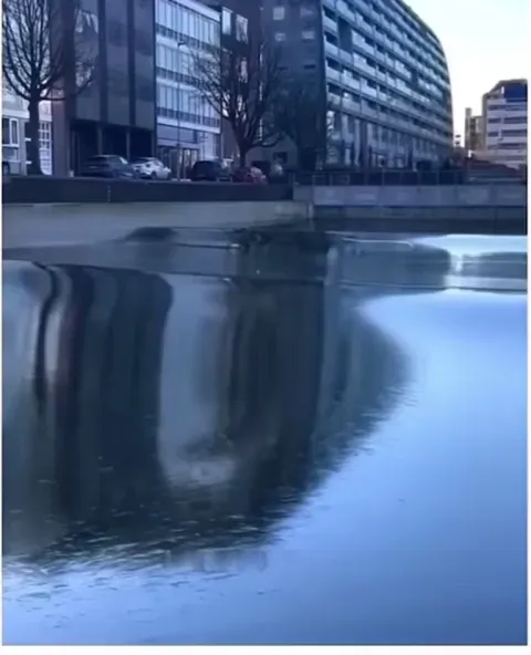 Wave on a frozen river