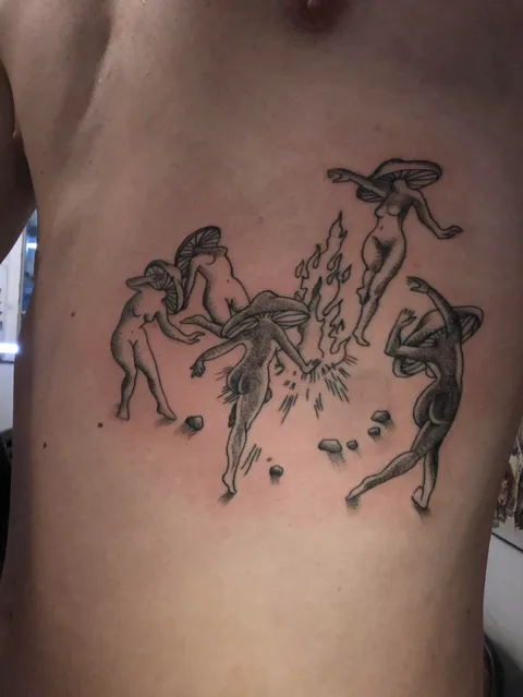 Mushroom ladies dancing around a fire. (Done by Caroline at 3Ravens in Athens, GA)