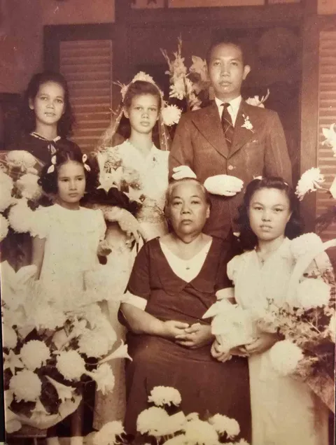 My paternal grandparents on their wedding day ~1944. She was 16 and he was 30. 