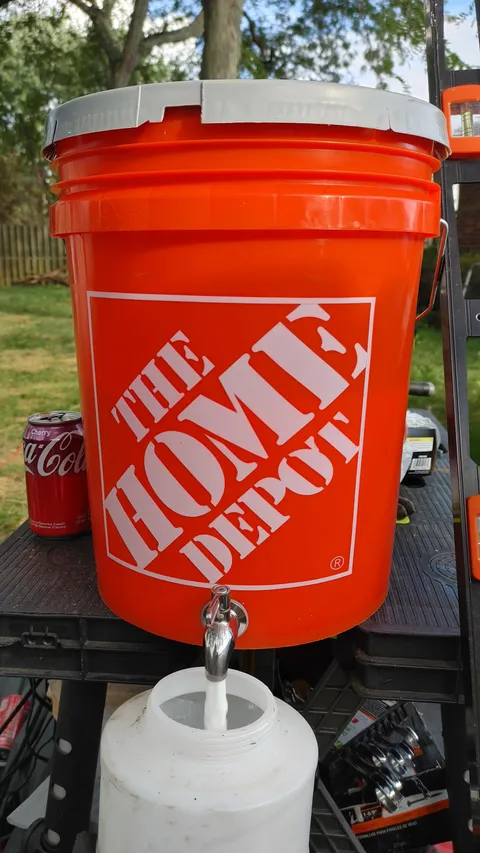 Just built a new privacy fence and now I'm sealing it. Put a metal drink spigot on a 5gal bucket to refill my sprayer tank much easier. Worked like a charm!